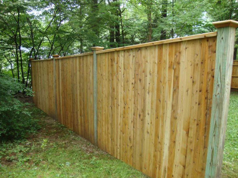 6' high traditional fence with colonial cap pressure treated posts ...