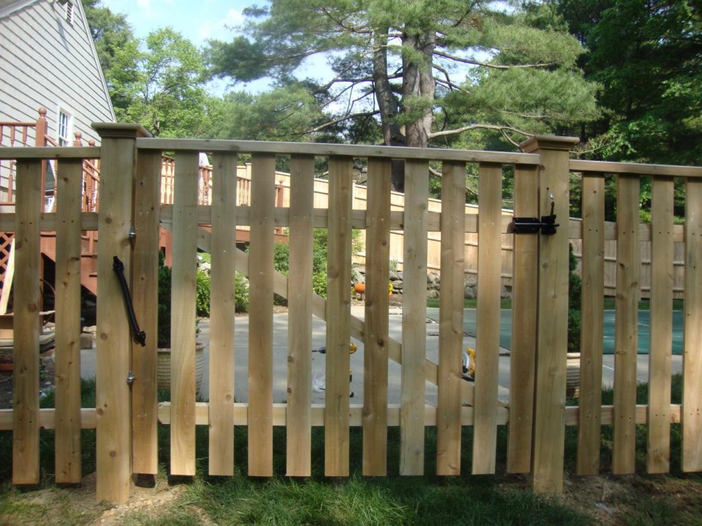 Open traditional cedar board walk gate - Reliable Fence